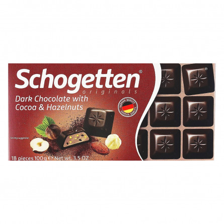 Шоколад Schogetten черный с какао-сливочной начинкой и кусочками фундука 100г