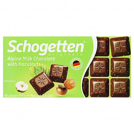 Шоколад Schogetten молочний з подрібненими ядрами горіха фундука 100г slide 1