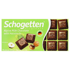 Шоколад Schogetten молочний з подрібненими ядрами горіха фундука 100г mini slide 1