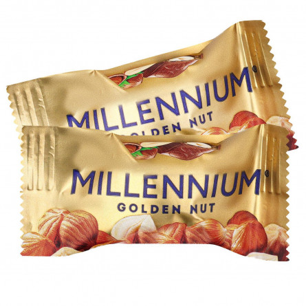 Цукерки Millennium Golden Nut з начинкою та цілими горіхами slide 1