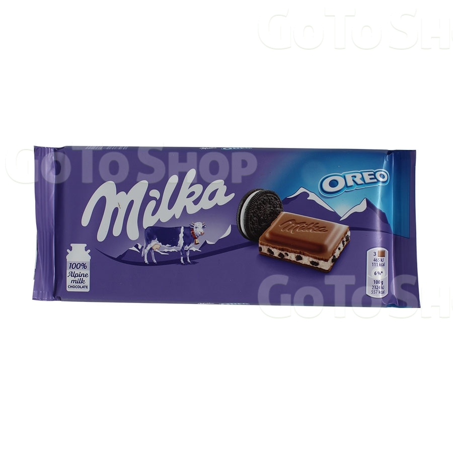 Шоколад 100г Milka молочний з кремовою начинкою та шматочками печива Орео 