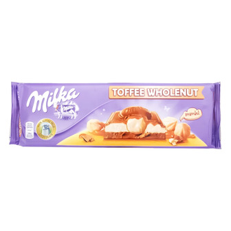 Шоколад молочний Milka з горіхом і карамеллю, 300 г