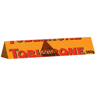 Шоколад молочний Toblerone з цукатами із апельсинової цедри та меленого імбиру і медово-мигдальною нугою 360 г (7622201437336)