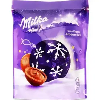 Цукерки Milka з молочного шоколаду з начинкою 90 г