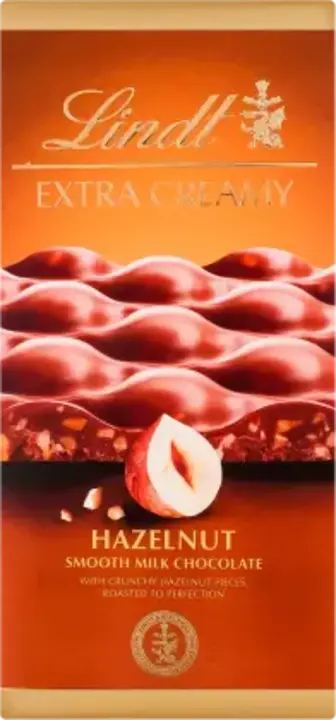 Шоколад Lindt Extra Сreamy молочний з горіхом 80 г