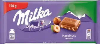 Шоколад Milka Huzelnuts молочний з подрібненим лісовим горіхом 150 г
