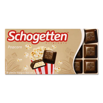 Шоколад молочний Schogetten молочний крем та шматочки попкорну (100г)