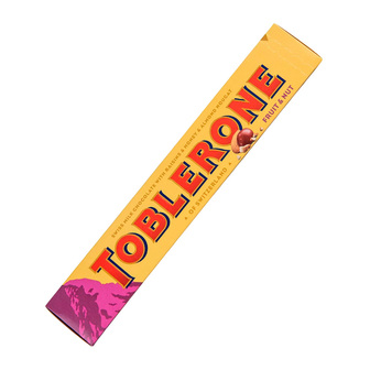 Шоколад "Toblerone" молочний з родзинками та подрібненими горіхами 100г