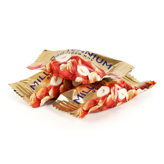 Цукерки Millennium Golden Nut з начинкою та цілими горіхами, 100г