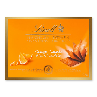 Цукерки Lindt молочні з апельсином, 125г