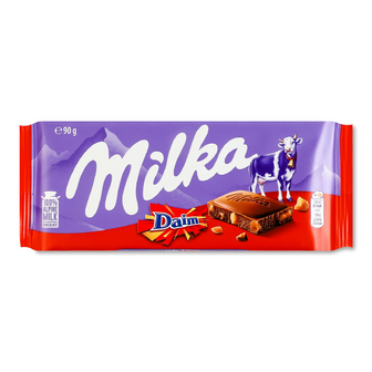 Шоколад молочний Milka зі шматочками хрумкої карамелі з мигдалем, 90г